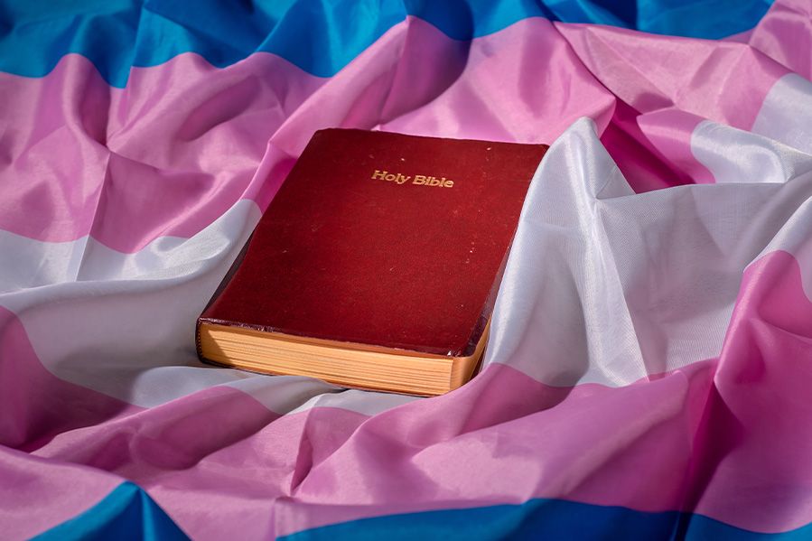 bible laying on trans flag