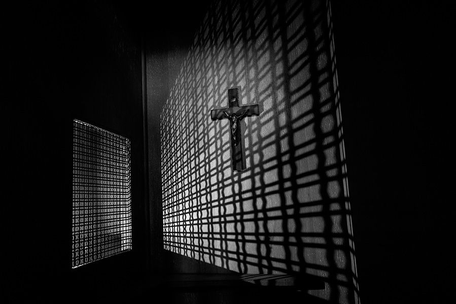 Catholic church confessional black and white