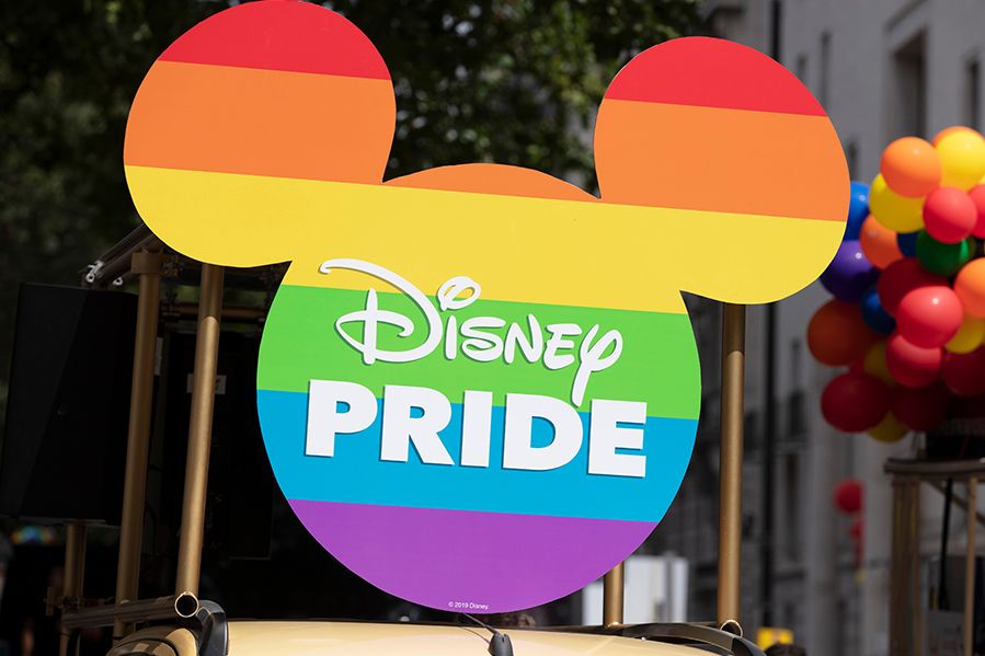 disney mouse sign with rainbow flag colors representing lgbt representation