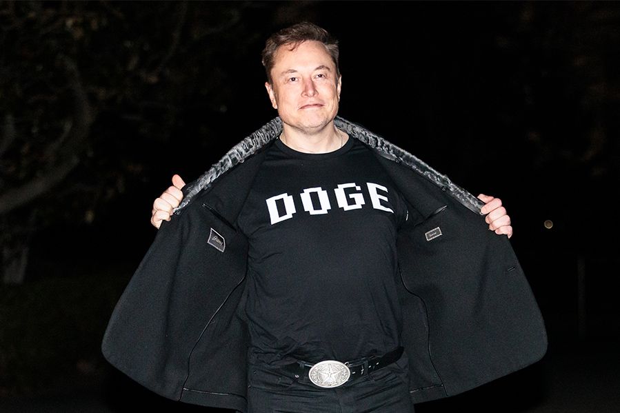 Elon Musk wearing DOGE shirt