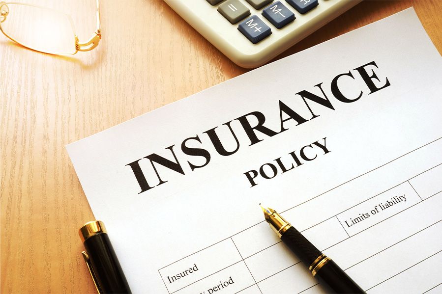 insurance policy on table