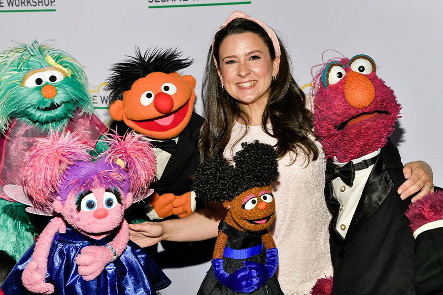 ms rachel at event with muppets
