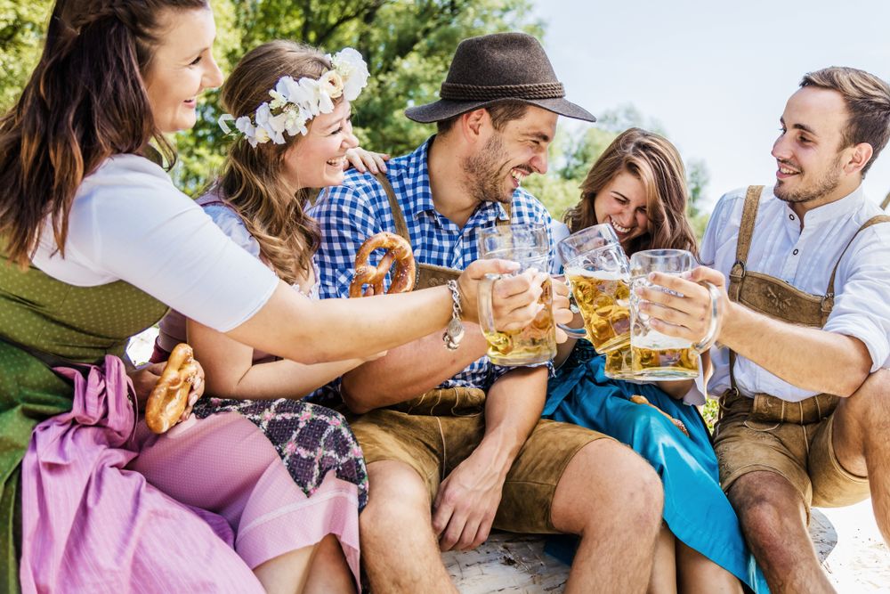A group of people drinking beer for Oktoberfest