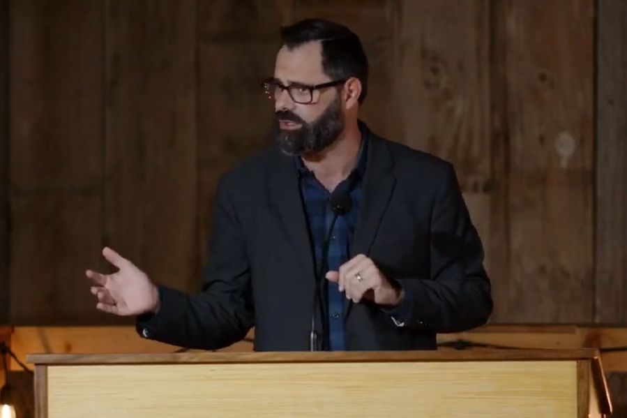 pastor joel webbon during sermon