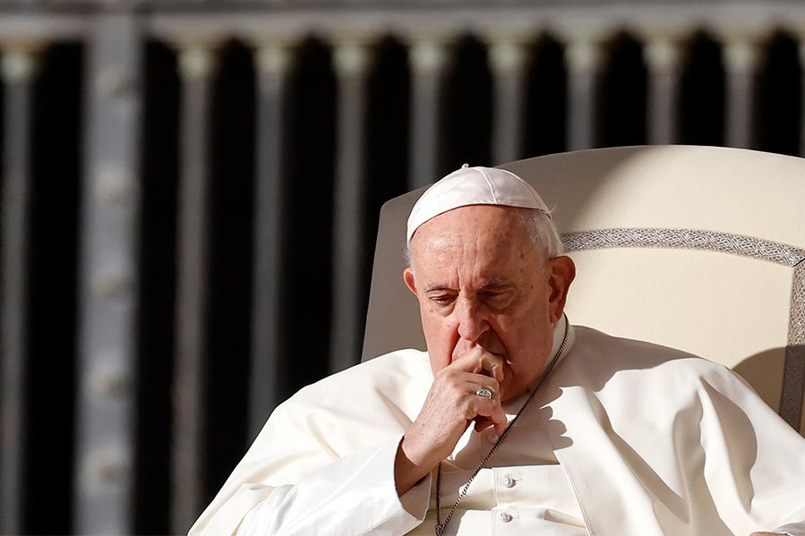 Pope Francis leaning on his hand