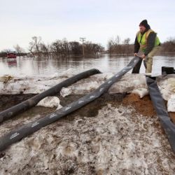 Weary Congregation Worships Despite Flood Conditions