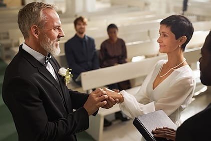 A young couple writing wedding vows